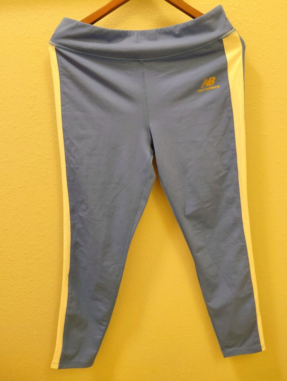 Womens New Balance Blue Leggings with White  Side Stripes. Size L.